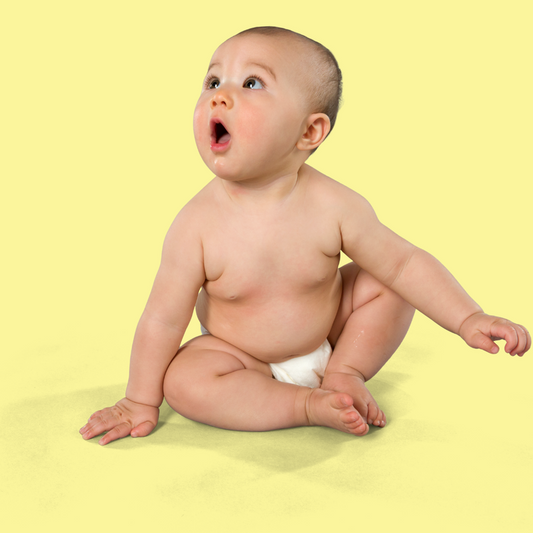 baby on yellow background